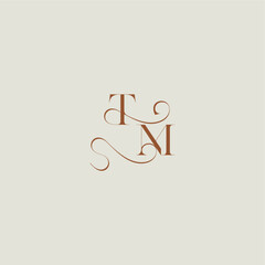 monogram wedding style logo concept initial with thin line TM contemporary modern curvy letter