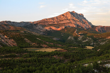 Sunset over Montagne Sainte-Victoire, near Aix-en-Provence, France. The warm evening light...