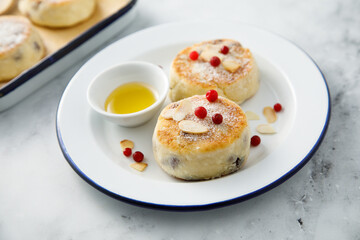 Homemade curd cakes with honey and almond