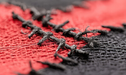 Explore the Intricate Beauty of Stitching with a Close-Up Look at Textured Fabrics and Creative Handmade Designs in Vibrant Colors and Unique Patterns