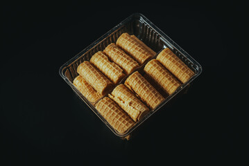 Box of Wafers on a Dark Surface