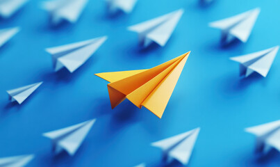The yellow paper airplane takes the lead in flying