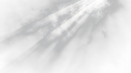 a black and white photo of a light shining through the clouds