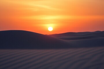 Obraz premium Serene Sunset Over Dunes with Warm Hues in a Desert Landscape