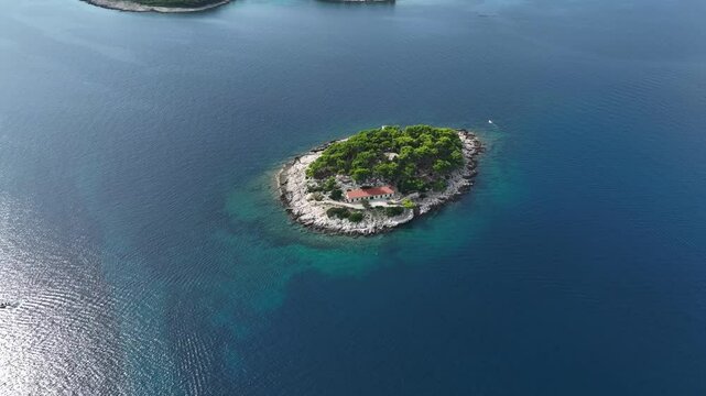 Former Fortress In Uninhabited Island Of Galisnik In Hvar, Croatia. aerial shot