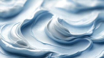 Obraz premium Blue and white whipped cream swirl texture. Smooth, creamy, and abstract pattern with soft colors. Ideal for beauty or food concepts.