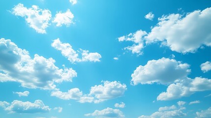 Obraz premium Bright blue sky with fluffy white clouds calm and clear weather