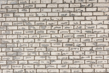 Background of white shabby brick wall,