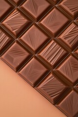 Rich, glossy chocolate squares arranged in an appealing geometri