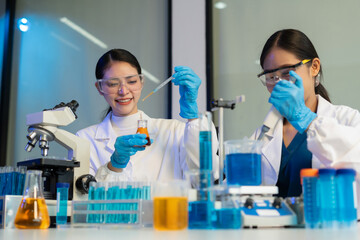 Fototapeta premium experiments containing chemical liquid in laboratory on glassware, innovative and technology.