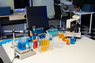 Workplace science lab test tubes, lab equipment.