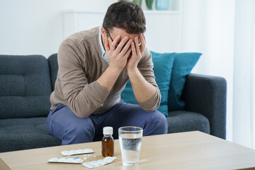 One man fighting cephalalgia with pills meds