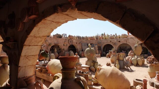 GUELLALA, TUNISIA &ndash; JUNE 16th, 2023: Gimbal footage of courtyard of ceramics center in Guellala, known for its pottery workshops and artist vibe
