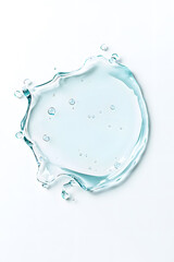 Fototapeta premium Water swirl splash top view isolated on white