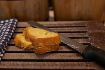 Freshly cut bread served breakfast hours in a cozy setting
