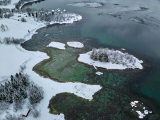 aerial winter landscape of the area around the fishing village of Stonglandseidet at the Tranoeyfjord on Senja Island in northern Norway, Scandinavia, Europe