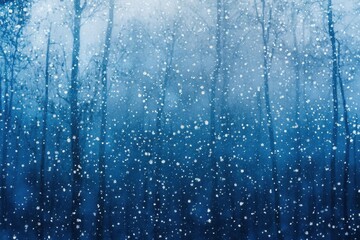 ethereal winter wonderland scene with delicate snowflakes suspended in misty blue air creating a...