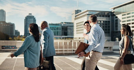 Teamwork, walking and business people in city in discussion on morning commute, travel and journey....