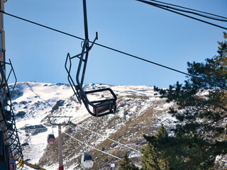 Chairlifts that go to the top of the ski resort so that skiers and snowboarders can start the...