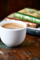 Cup of coffee on wooden background. Soft focus. Copy space