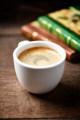 Cup of coffee on wooden background. Soft focus. Copy space