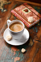 Cup of coffee on wooden background. Soft focus. Copy space