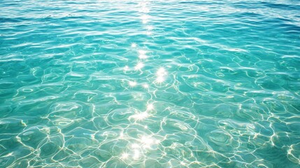 Bright sun reflections dance on clear turquoise water in a serene tropical paradise, inviting relaxation and adventure for all nature lovers and beach enthusiasts