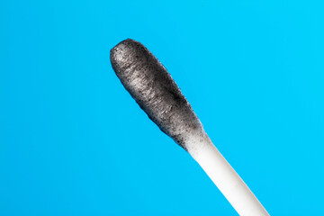 probe for a swab from the nose and nasopharynx on a blue background for the presence of infections and bacteria, sensitivity to antibiotics, macro