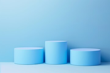 three blue cylindrical podiums on a blue background. Minimalist design for product display or presentation.