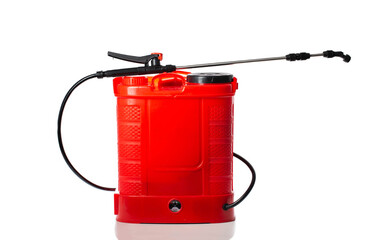 Fototapeta premium Modern red battery-powered sprayer with a retractable fishing rod for spraying plants against pests, spreading fertilizers on a white background, isolate. Agriculture, close-up, gardening