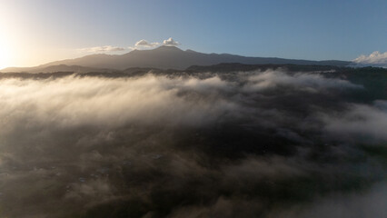 Obraz premium Drone aerial view of Platanar Volcano above the clouds in Costa Rica