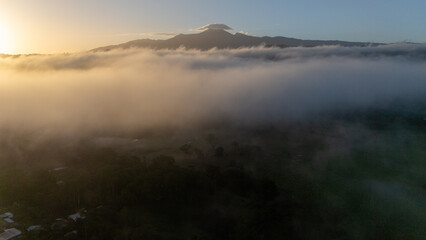 Drone aerial view of Platanar Volcano above the clouds in Costa Rica