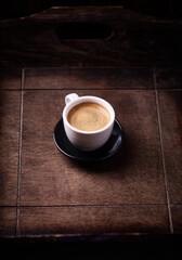 Cup of coffee on wooden background. Soft focus. Copy space