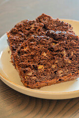 close-up of freshly sliced banana chocolate bread, showing its moist texture, rich chocolate swirls