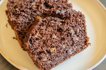 close-up of freshly sliced banana chocolate bread, showing its moist texture, rich chocolate swirls