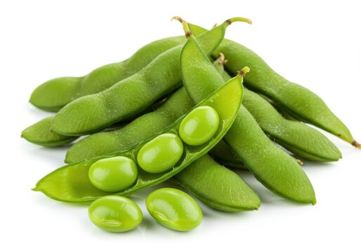 Fresh green edamame pods with shelled beans, isolated on a white background