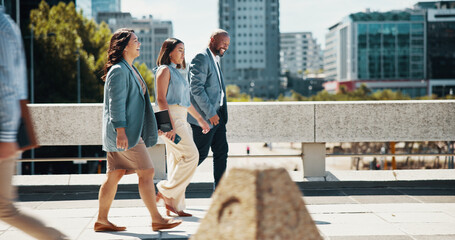 Walking, business people and group in city, travel and urban town with buildings, metro and commute. Outdoor, employees or coworkers in street, journey and morning with routine, diversity or New York