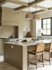 The kitchen island features built in cabinets and features pendant lights