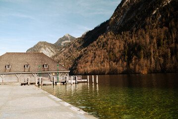 Fototapeta premium pier on Konigssee, known as Germany's deepest and cleanest lake, located in the extreme southeast Berchtesgadener Land district of Bavaria, near the Austrian border.