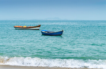 Fototapeta premium Two boats in the calm sea in Buzios