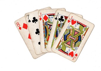 A poker hand of vintage playing cards on a white background.