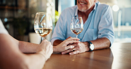 Alcohol, holding hands and senior couple in home, partnership celebration and love on valentines day. Romance, affection and loyalty to spouse in relationship, trust and glasses of wine for date