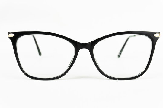 Black-framed eyeglasses on a white background, suitable for themes related to vision, fashion, or education.