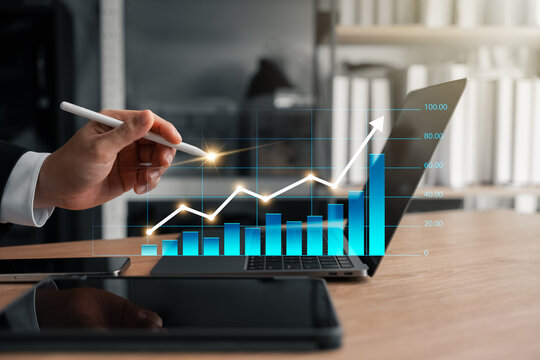 Businessman analyzing business performance data, financial data analysis, graphs, charts, statistical reports, company development, planning and accounting, strategy analysis and investment planning.