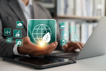 Social investment business concept. ESG and environmental governance, businessman use tablet research sustainable global clean energy, sustainable and ethical corporate development.