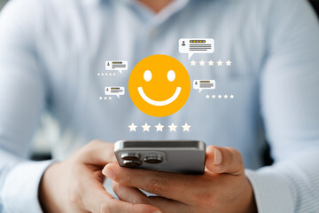 Satisfaction survey, customers use smartphones to rate their experience with five stars, online...