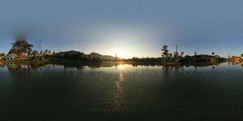 Fototapeta premium sunset over the lake