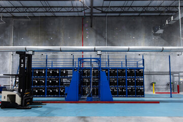 Electric forklift charging station in warehouse © Francisco