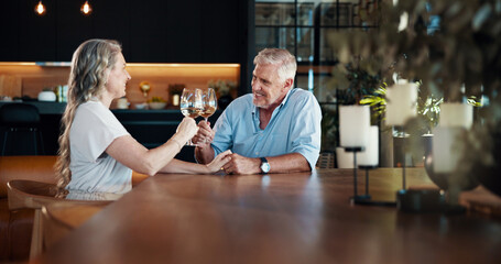Cheers, love and mature couple with champagne in home for celebration, romance and marriage on date. Happy, commitment and man with woman for glass of wine with anniversary toast together in house.