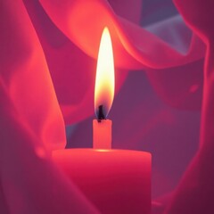 Candle flame illuminated against soft pink fabric creates a warm and tranquil atmosphere, perfect for relaxation and meditation moments